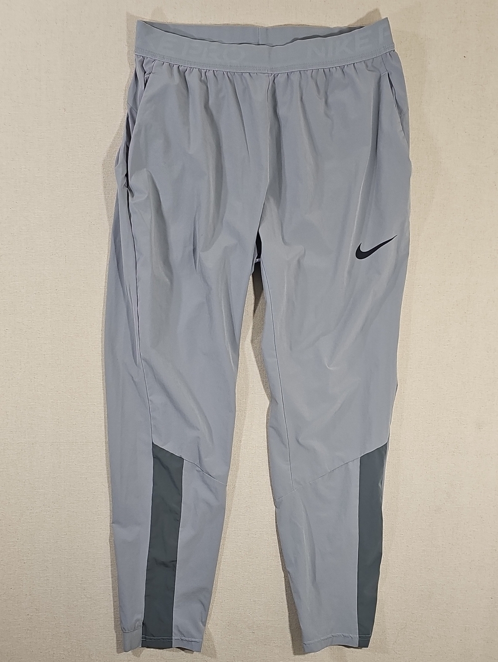 Nike Men’s Light Gray Performance Track Pants with Dark Gray Accents